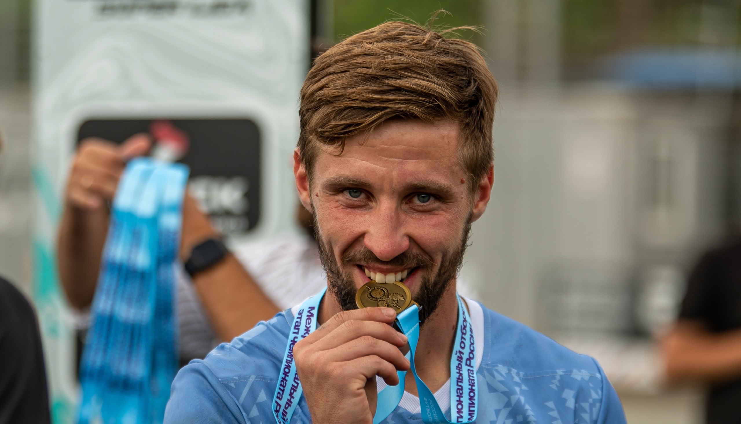 Игрок с медалью